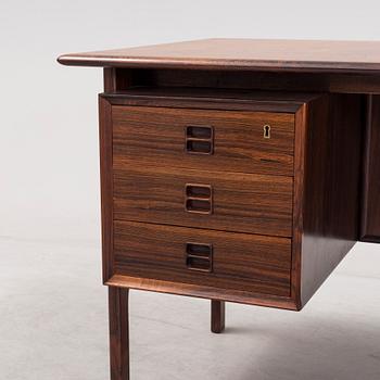 A 1960´s  Danish writing desk veneered with jakaranda, possibly designed by Arne Vodder.