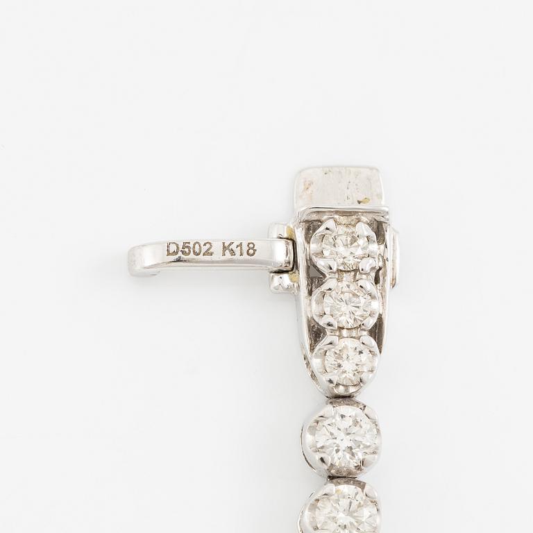 Tennis bracelet 18K white gold with brilliant-cut diamonds.