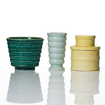 Wilhelm Kåge, A set of three ceramic flower pots, a vase and jar with lid,  Gustavsberg 1930s.