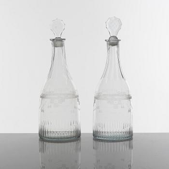 A pair of Swedish Empire cut-glass caraffes, circa 1800.