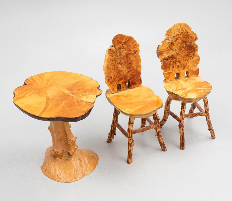 A burl table and a pair of burl chairs, Sweden, 20th century.