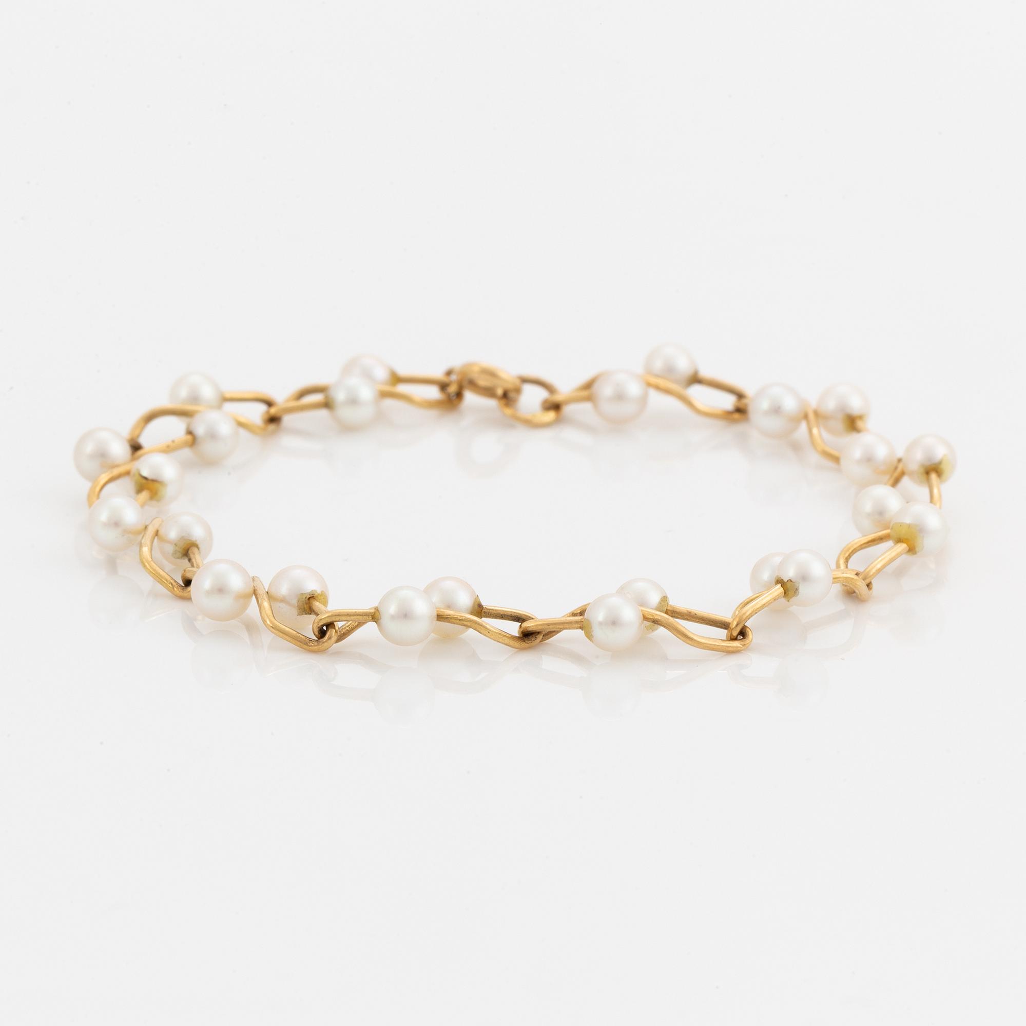 Armband, 18K guld med pärlor.