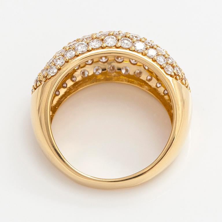 Sormus, bombé, 18K kultaa ja briljanttihiottuja timantteja.