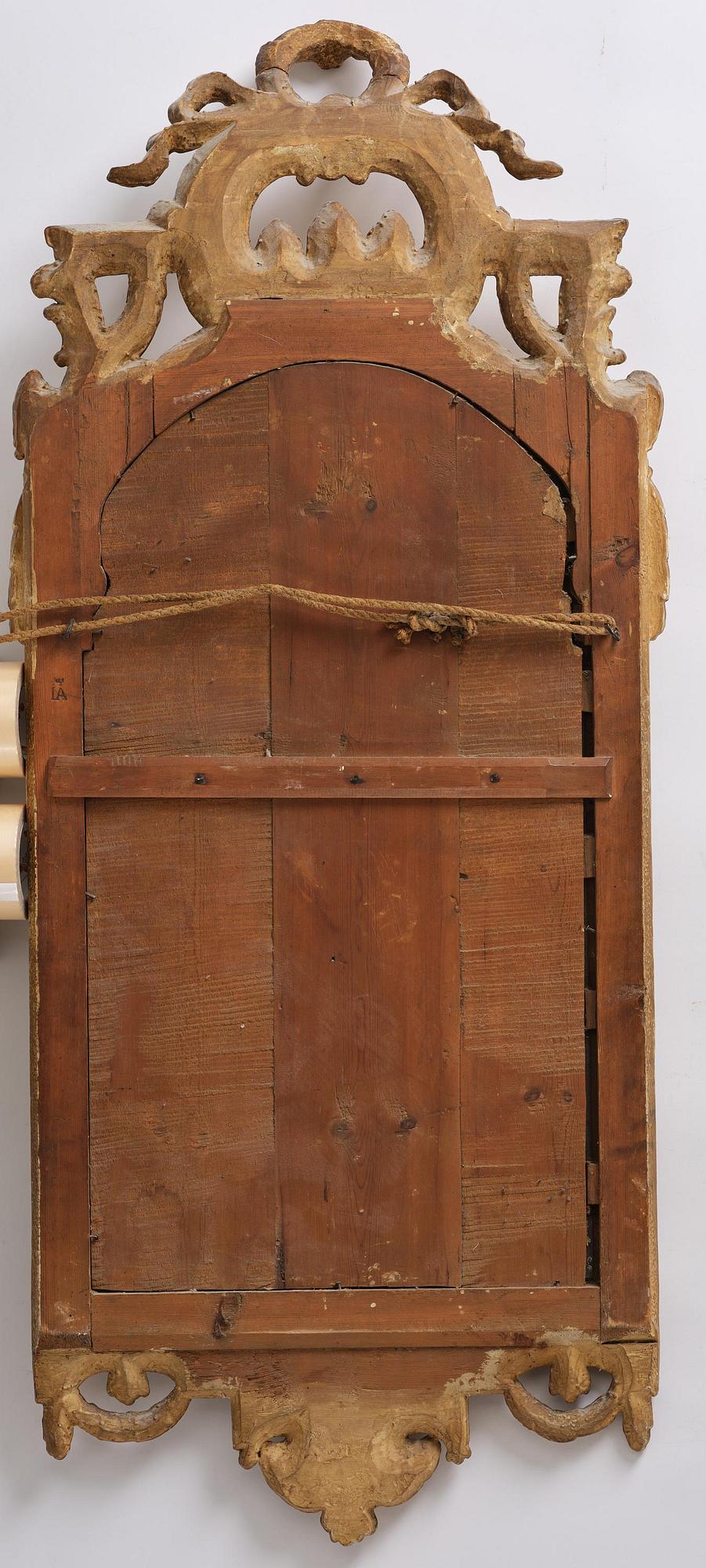 A Trasitional giltwood mirror by J. Åkerblad (master in Stockholm 1758-99).