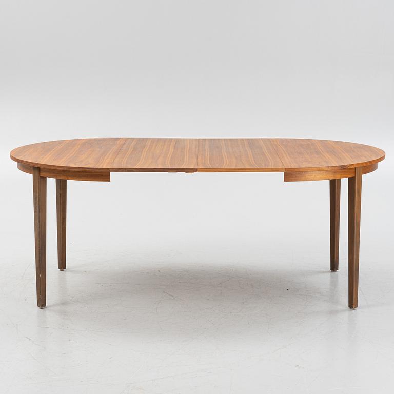 A walnut veneer dining table, 1950-60s.