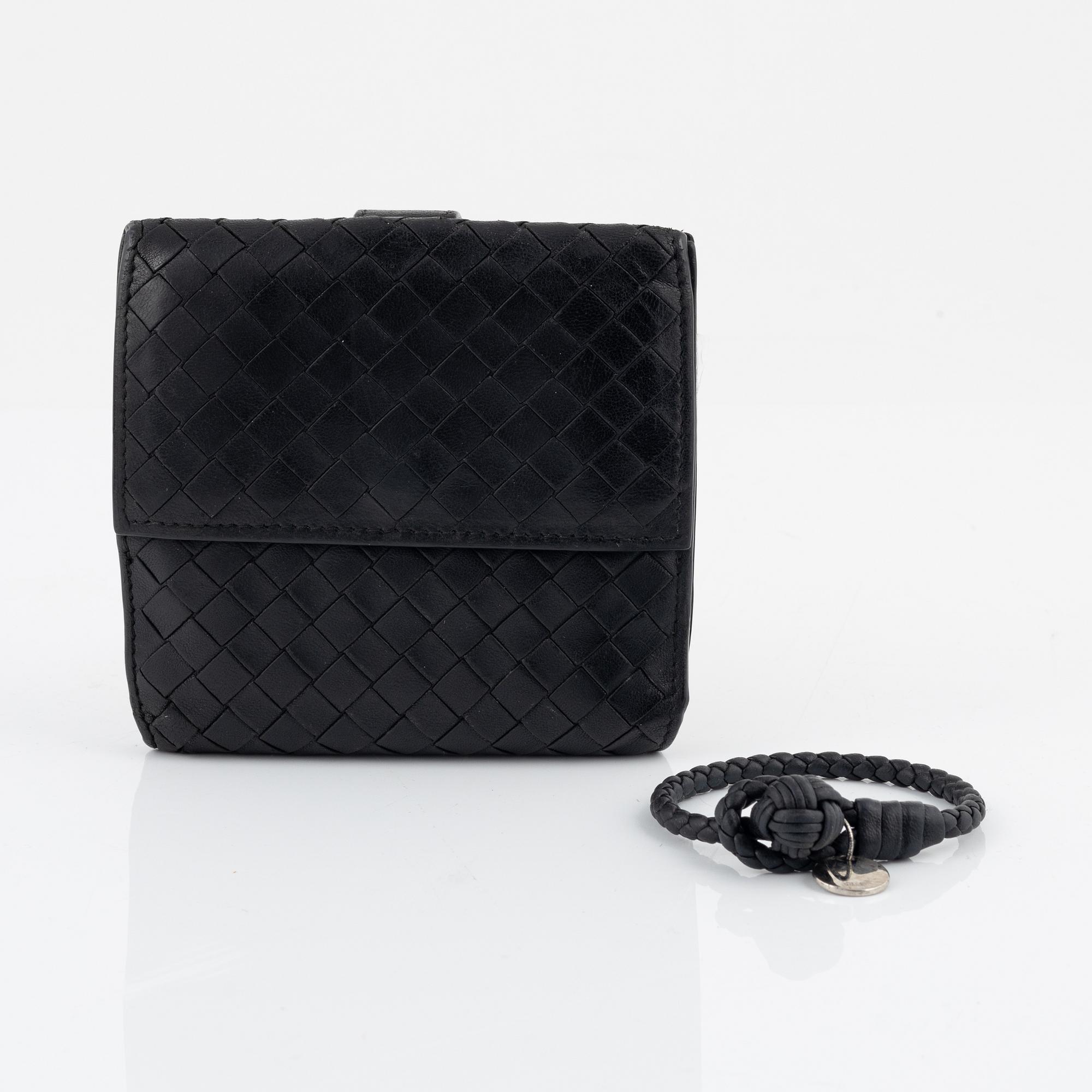 Bottega Veneta, a wallet and bracelet.