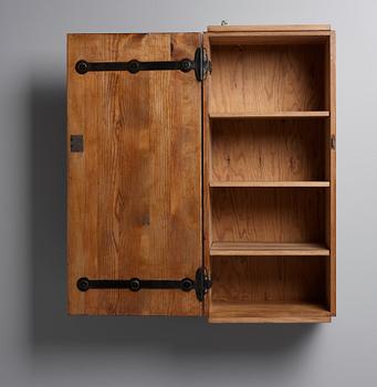 An Axel Einar Hjorth pine wall cabinet, Nordiska Kompaniet, Sweden 1930's.