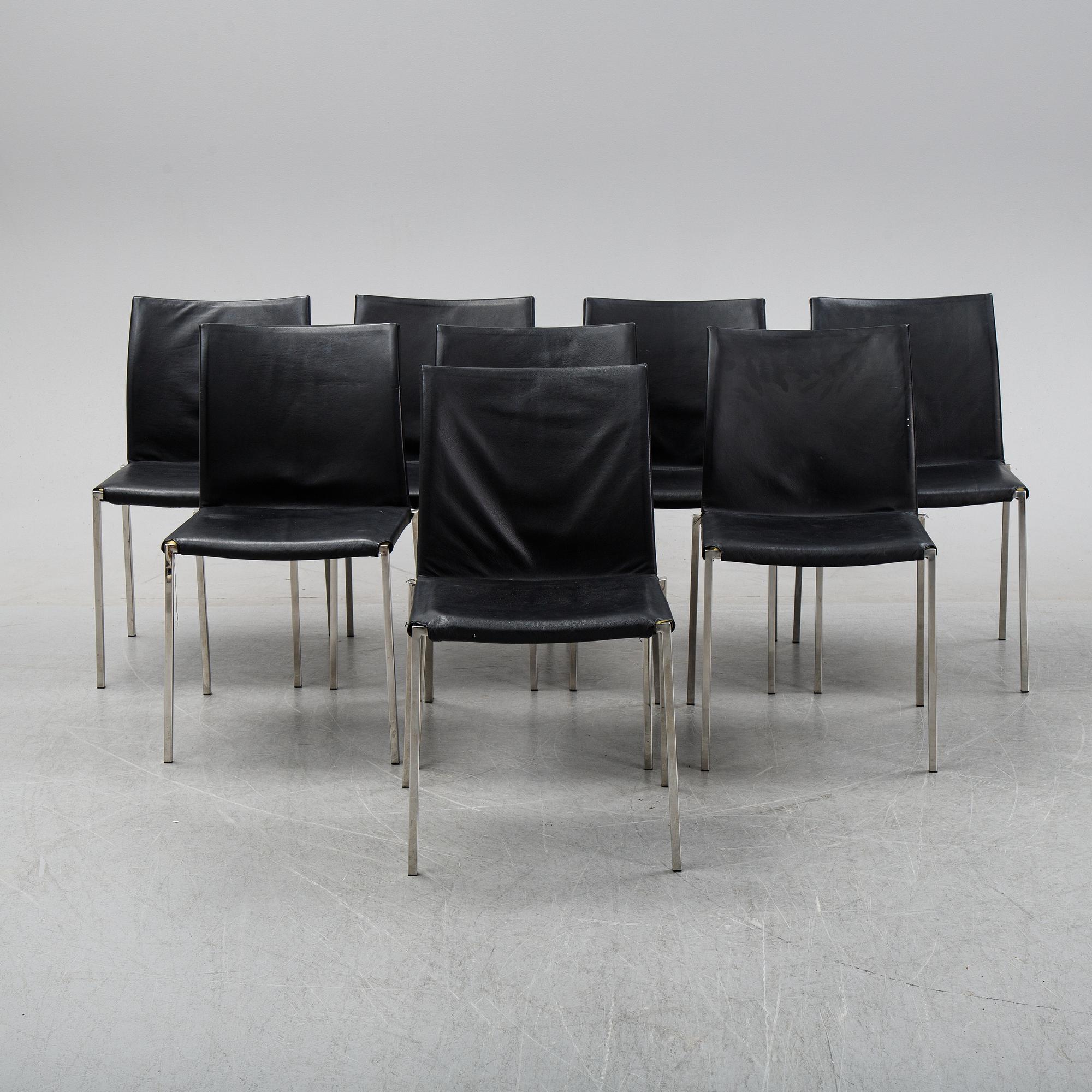 A set of eight steel and leather chairs, 21th century.