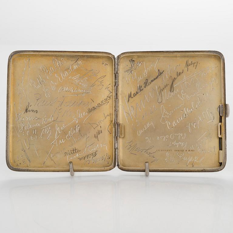 Two silver cigarette cases, J. H. Werner, Berlin, 1922, and Huguenin Frères, Switzerland before 1933.
