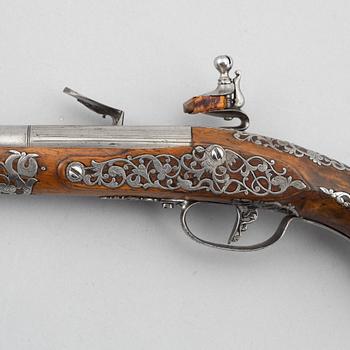 Flintlock pistol, signed Ivan Garatto. Brescia 17th century.