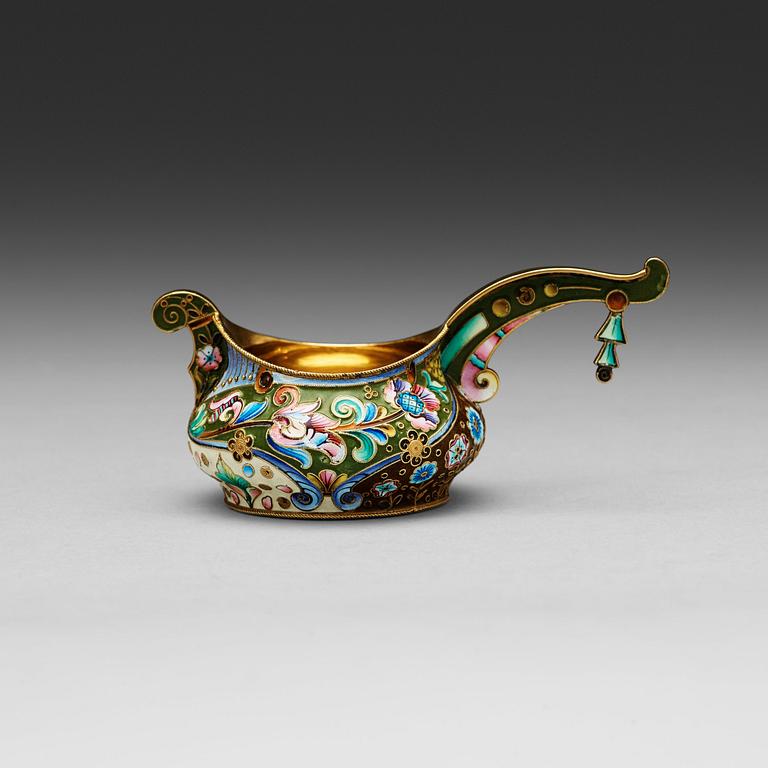 A Russian 20th century silver-gilt and enamel kovsh, marks of the 20th Artell, Moscow 1908-1917.