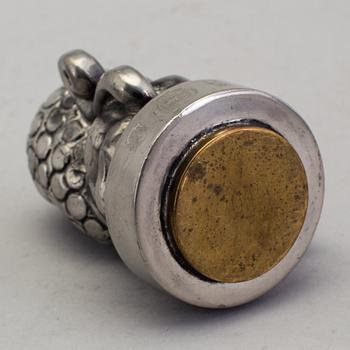 ANNA PETRUS, seal stamp with a brass stamp, pewter and brass, Svenskt Tenn, 1981 (year mark blurred).