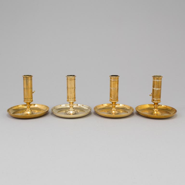 Four brass candlesticks from Skultuna and Svenska Metallverken, second half of the 20th Century.
