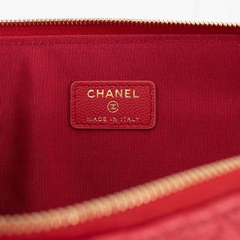 Chanel, a red leather clutch, 2017-2018.