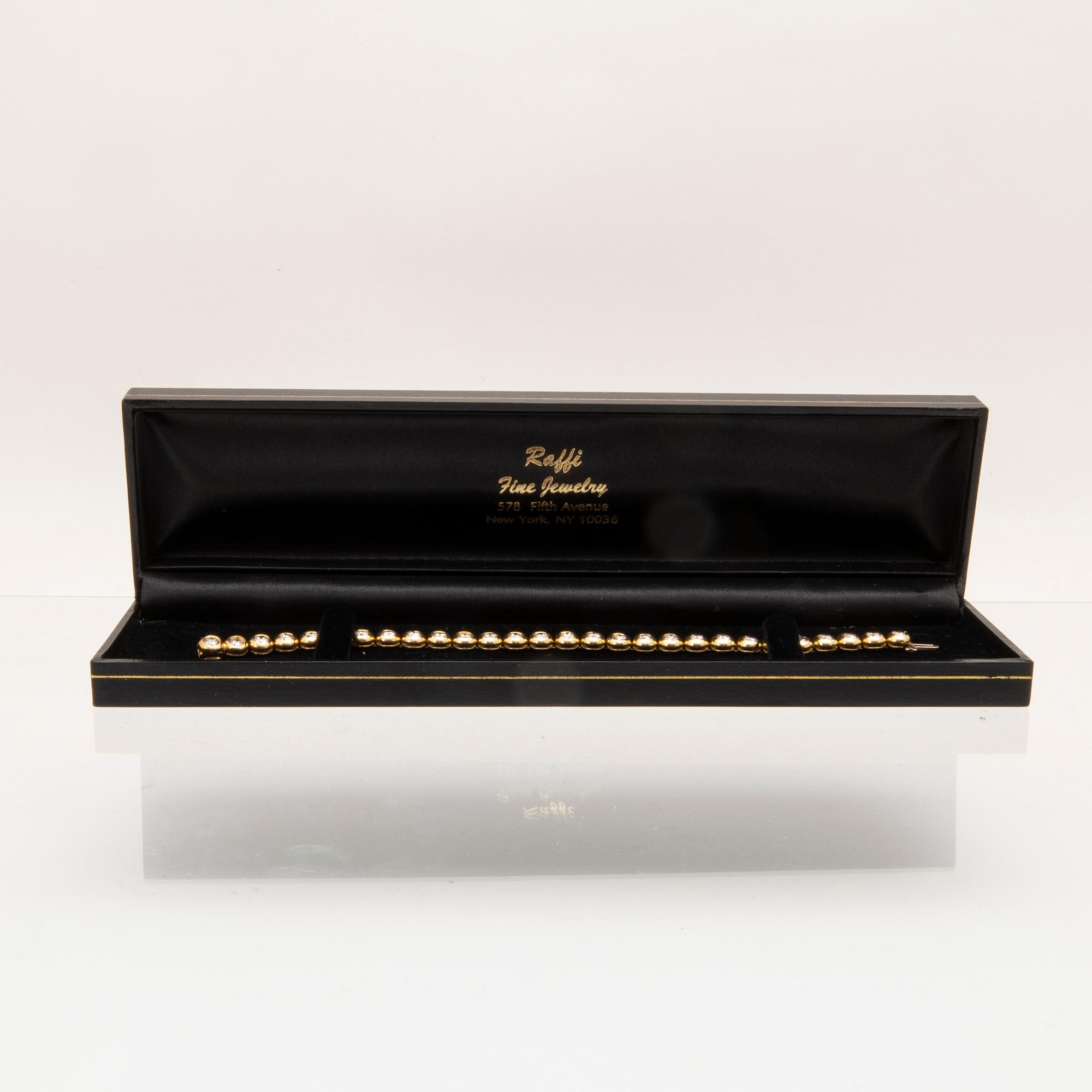 Tennisarmband 18K guld och runda briljantslipade diamanter.