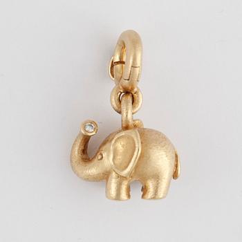 BERLOCK, Ole Lynggaard, "My little World", 18k guld med briljantslipad diamant ca0,01ct. Vikt 8,7g.
