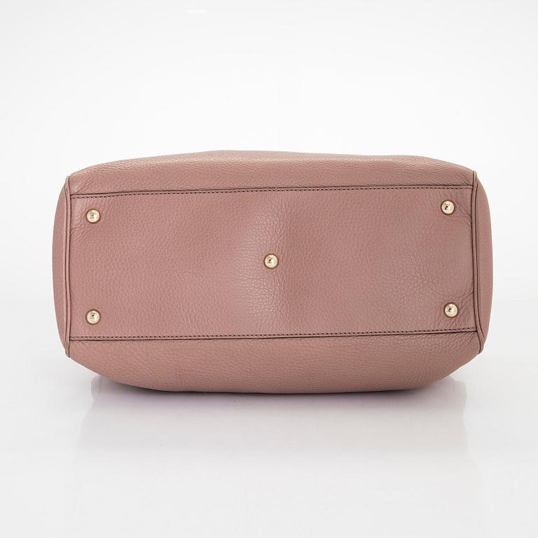Gucci, a 'Bamboo shopper' bag.