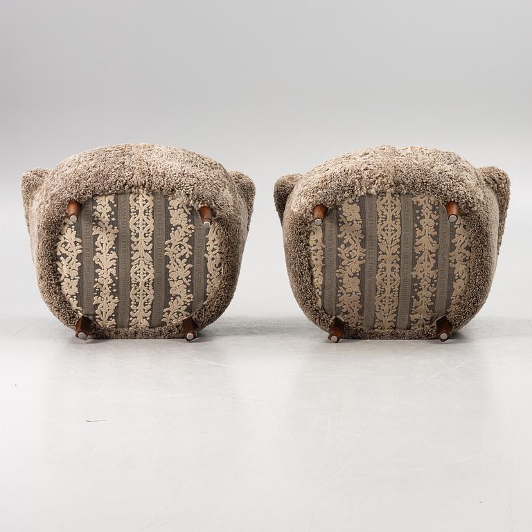 A pair of easy chairs, mid-20th century.
