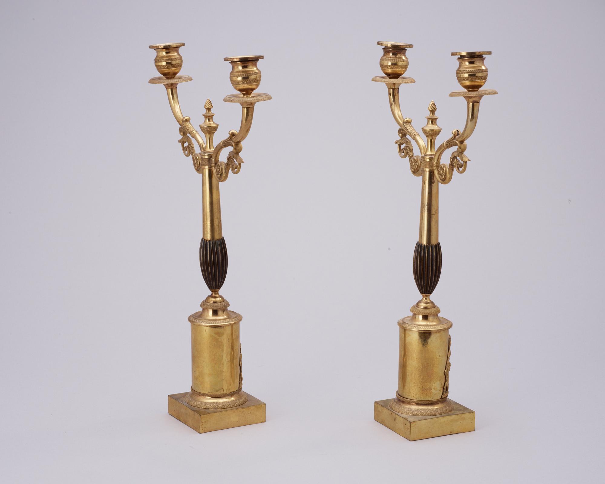 A pair of Swedish Empire 19th century gilt bronze two-light candelabra.