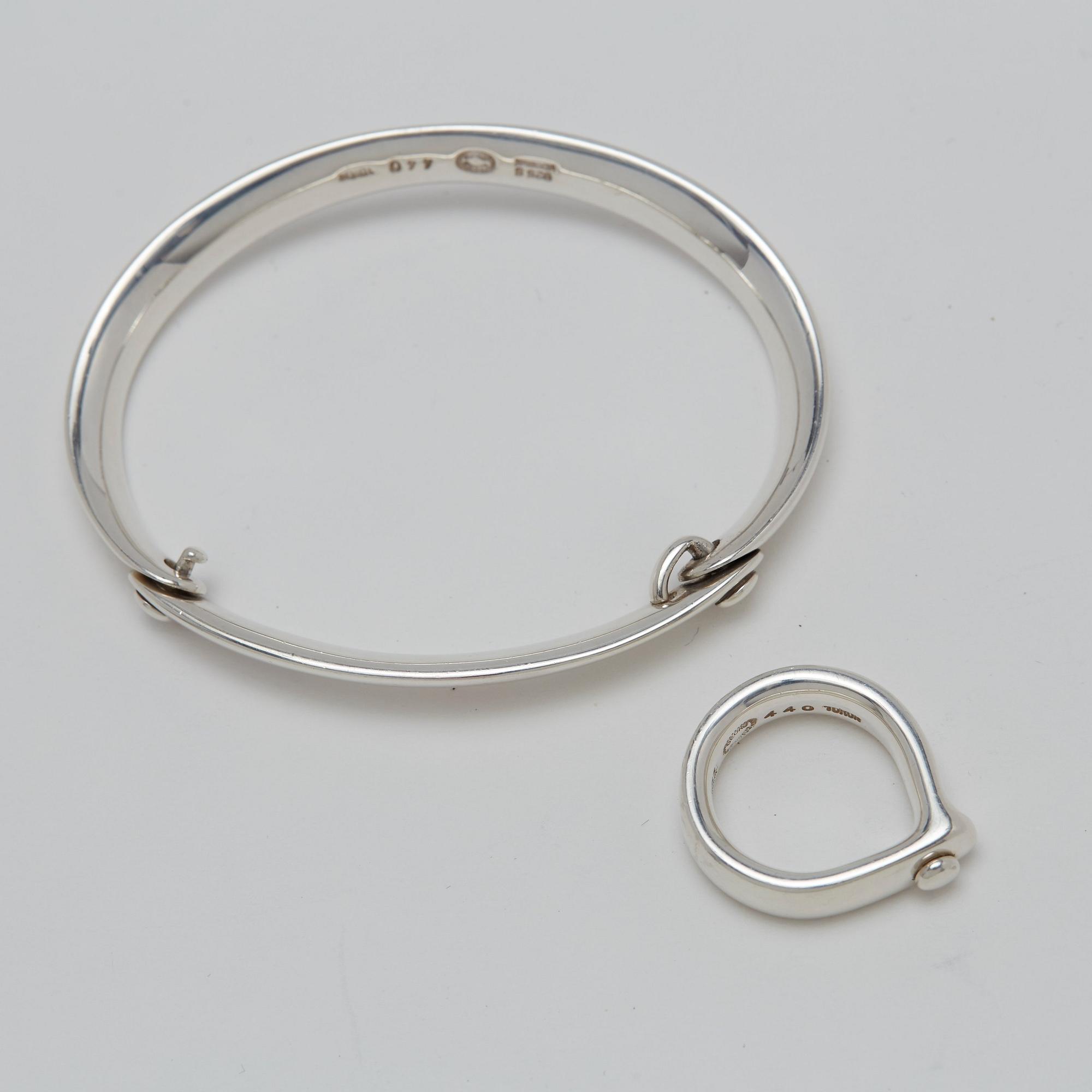 Vivianna Torun Bülow-Hübe, a sterling set of a necklace, a bangle and a ring, by Georg Jensen, Copenhagen.
