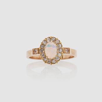 An opal and old-cut diamond ring.