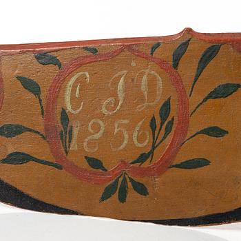 A carved and polychrome painted folk art wedding gift, Sweden, dated 1856.