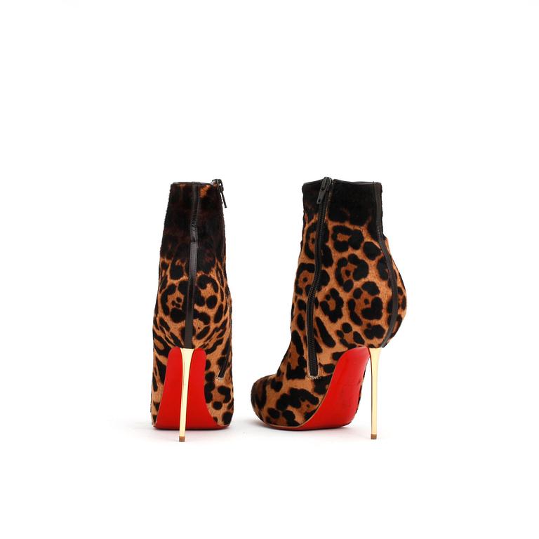 CHRISTIAN LOUBOUTIN, ett par skoletter, "Big Lips". Storlek 36,5.