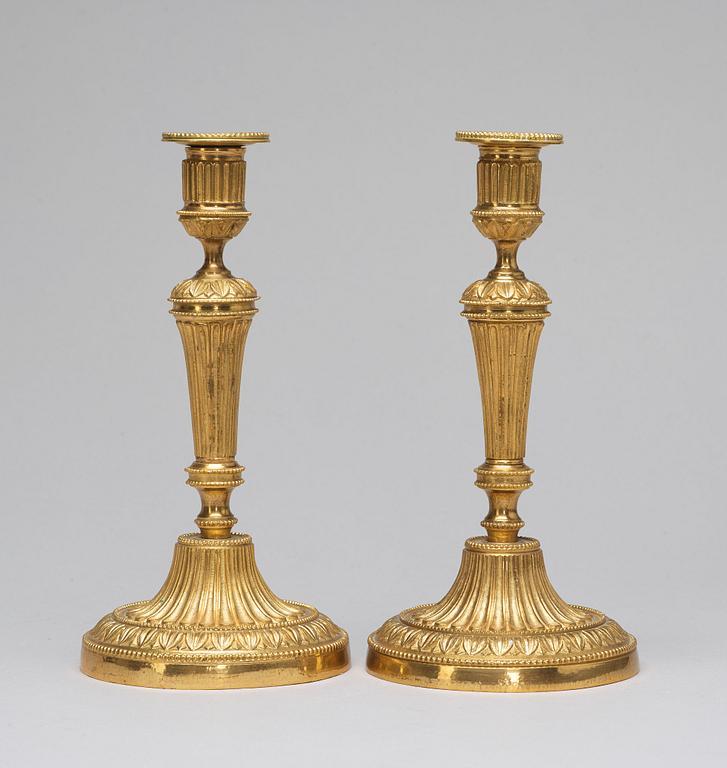 A pair of candlesticks, Louis XVI-style, circa 1900.