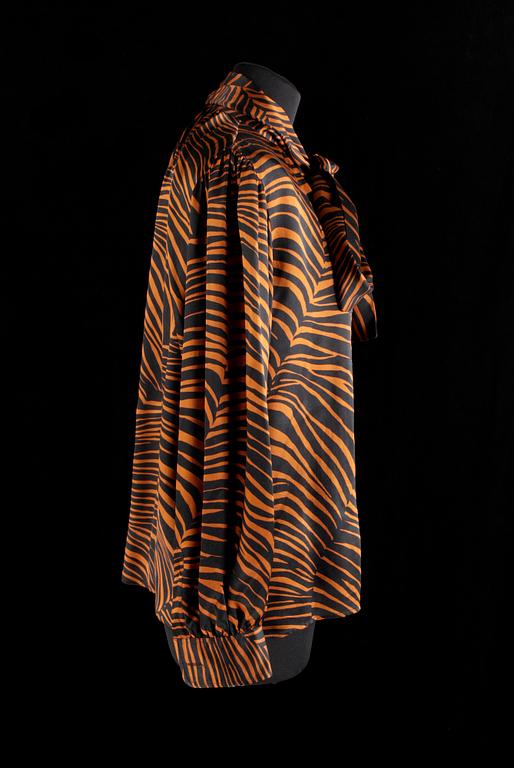 A set of two blouses by Yves Saint Laurent.