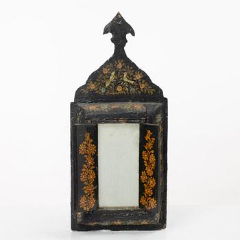 A lacquer persian mirror around the year 1900.