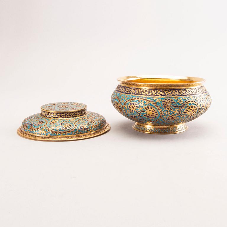 An Indian 19th century gilded jar with lid.