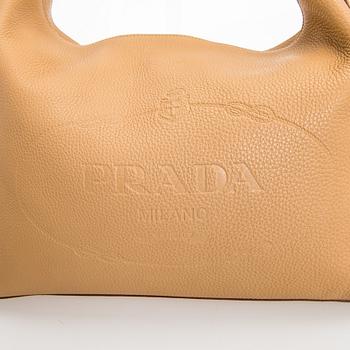 Prada, a Vitello Daino Leather Hobo Bag.