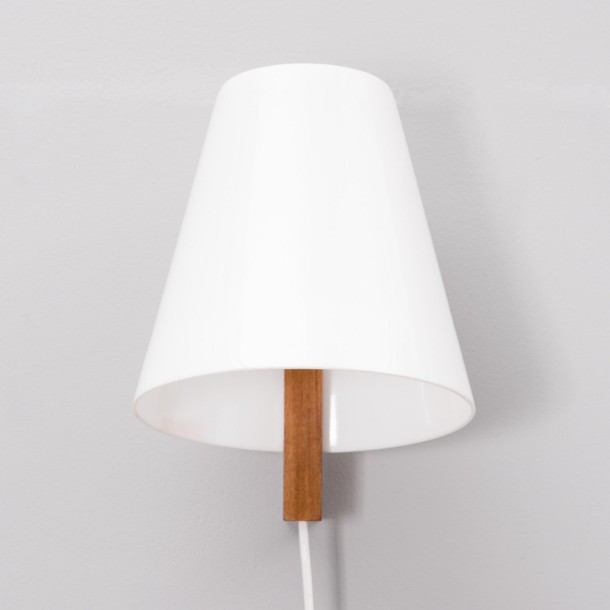 a 1960s wall lamp made by Sanka for Stockmann.