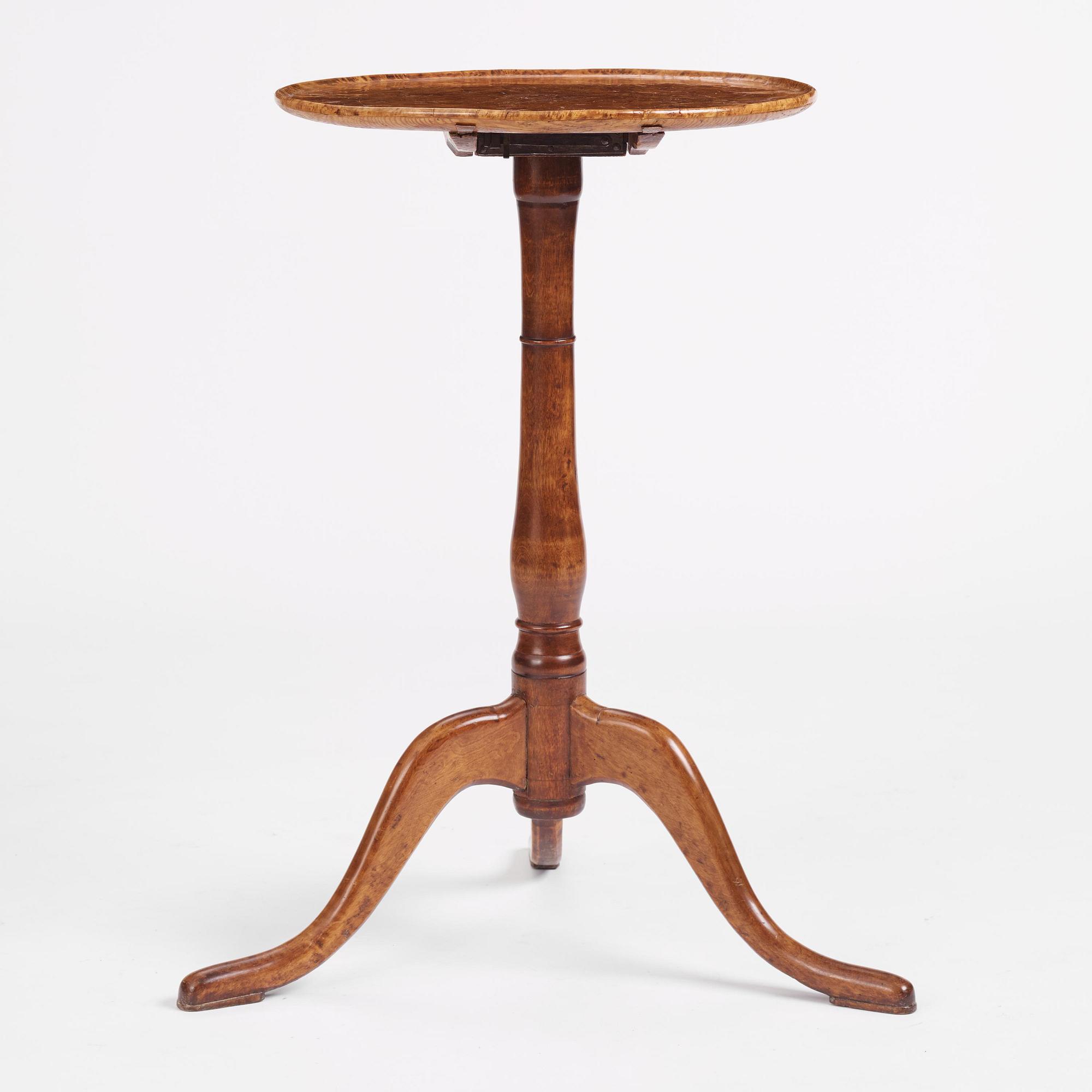A burr-alder tilt-top table by J. Sjölin (master 1767-1785).