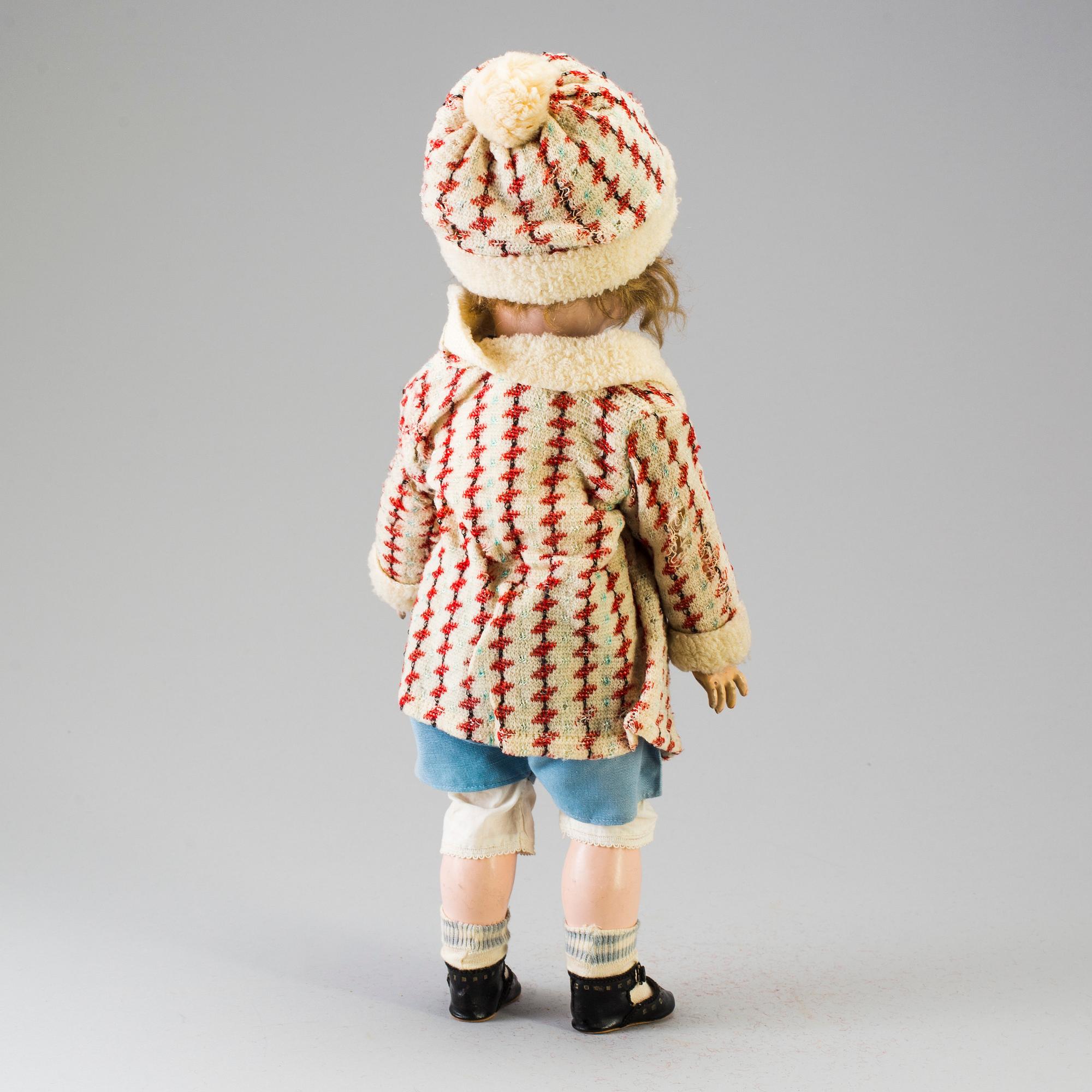 A bisque headed doll, Germany, early 20th century.