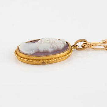 A hardstone cameo pendant with chain.