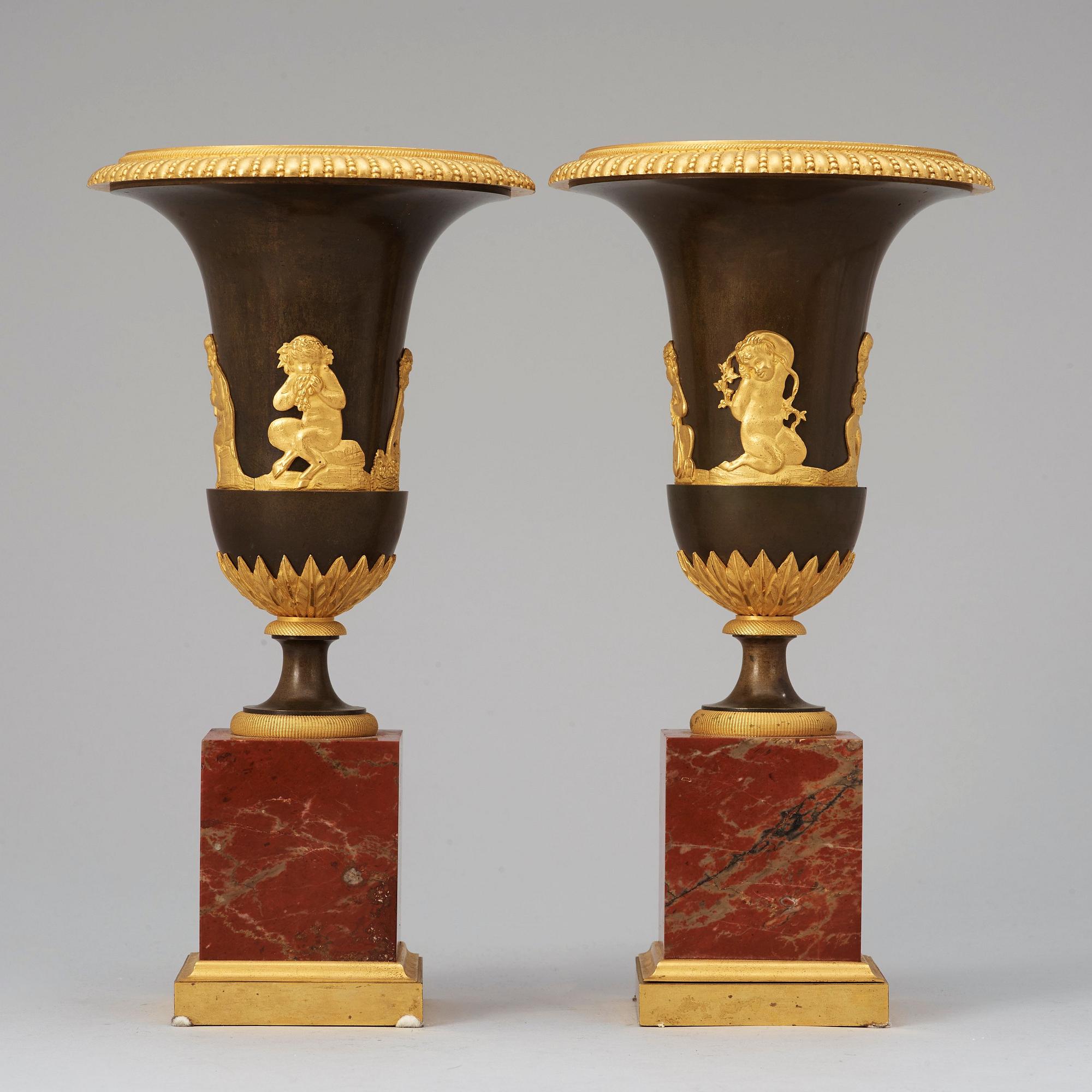 A pair of French Empire early 19th century urns.