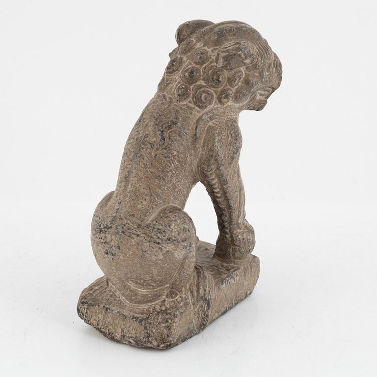 A Chinese stone Buddhist lion, Ming dynasty (1368-1644).