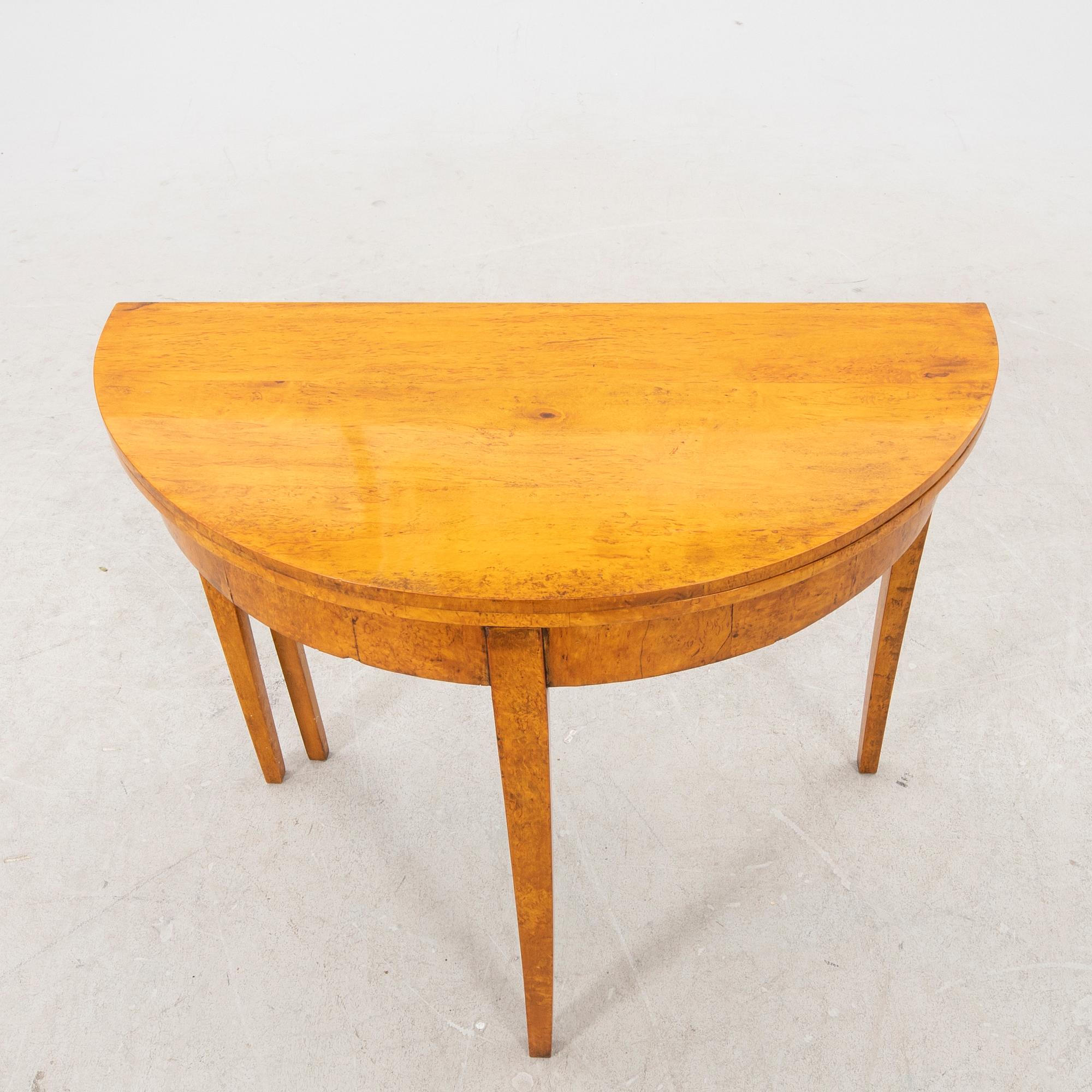 A birch folding table later part of the 19th century.