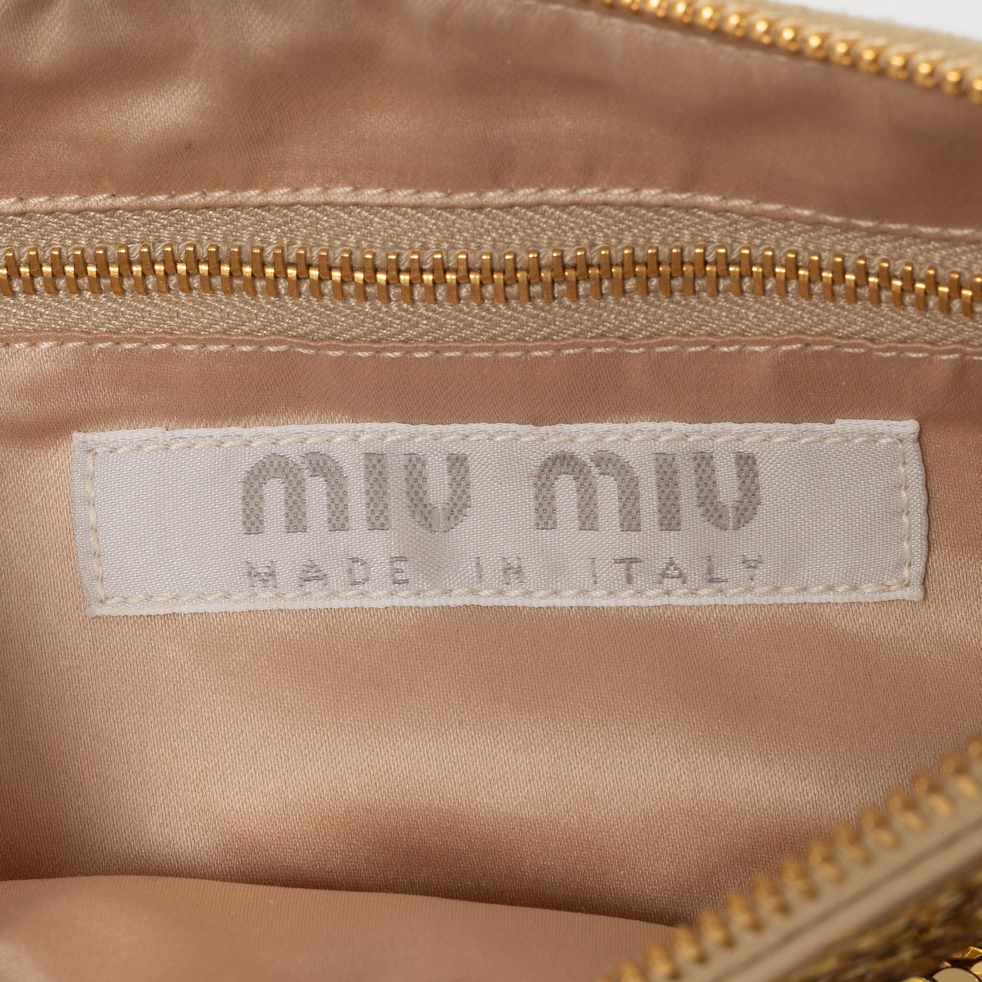 Miu Miu, a handbag.