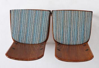 Axel Einar Hjorth, a pair of stained pine "Lovö" chairs, Nordiska Kompaniet, Sweden 1930's.