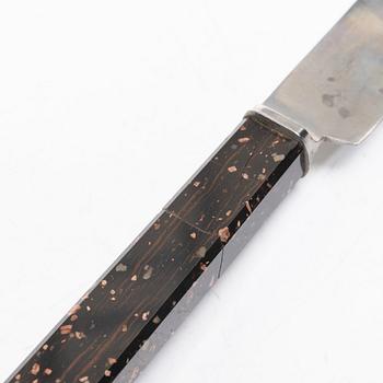 Six 19th century table knives with porphyry handles, Sweden.