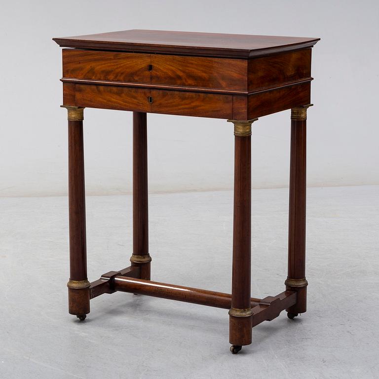 A mid 19th century sewing table.