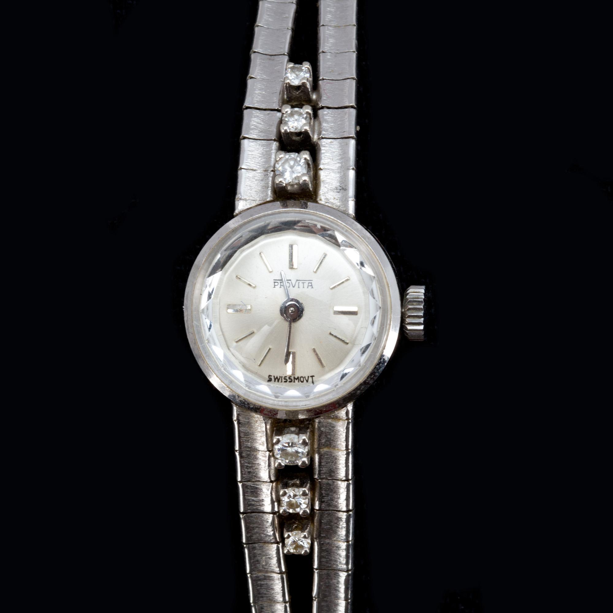 DAMARMBANDUR, 14 k vitguld med briljantslipade diamanter ca 0,20 ct, Provita. Vikt ca 18 g.