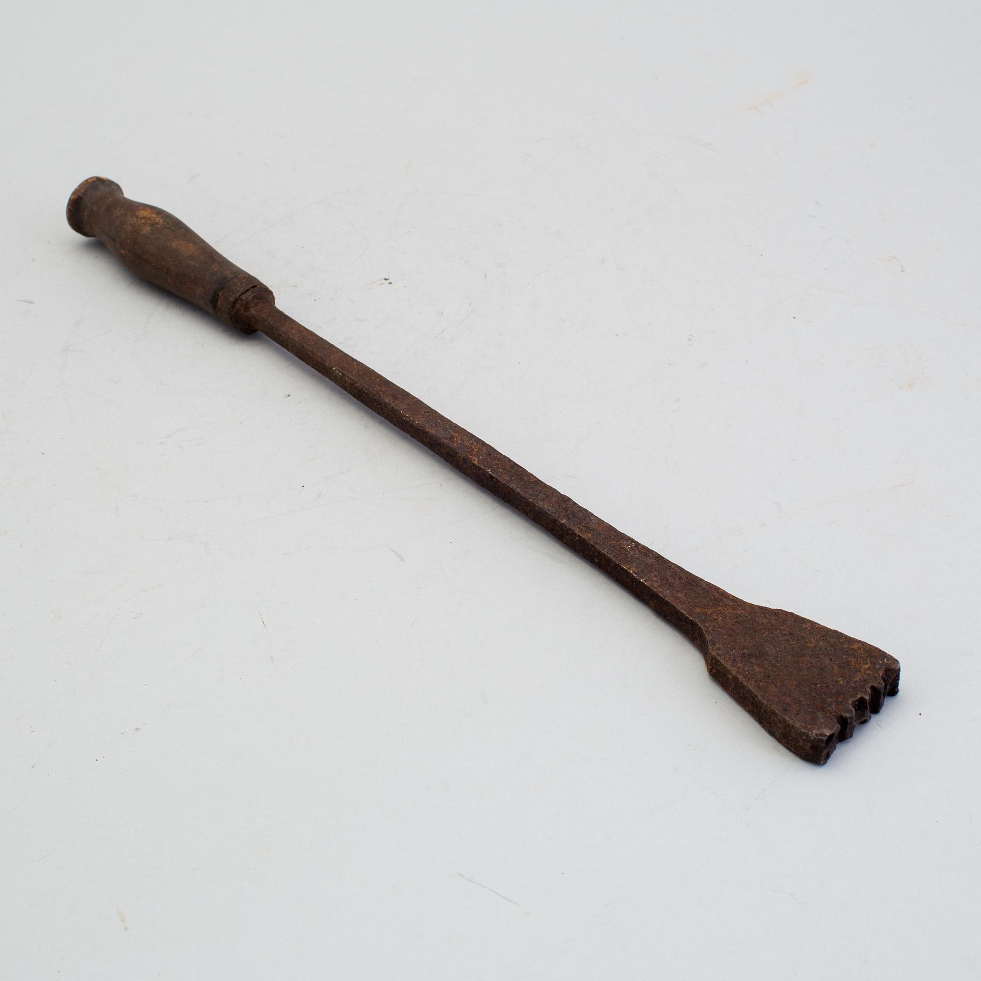 A 18th century branding iron.