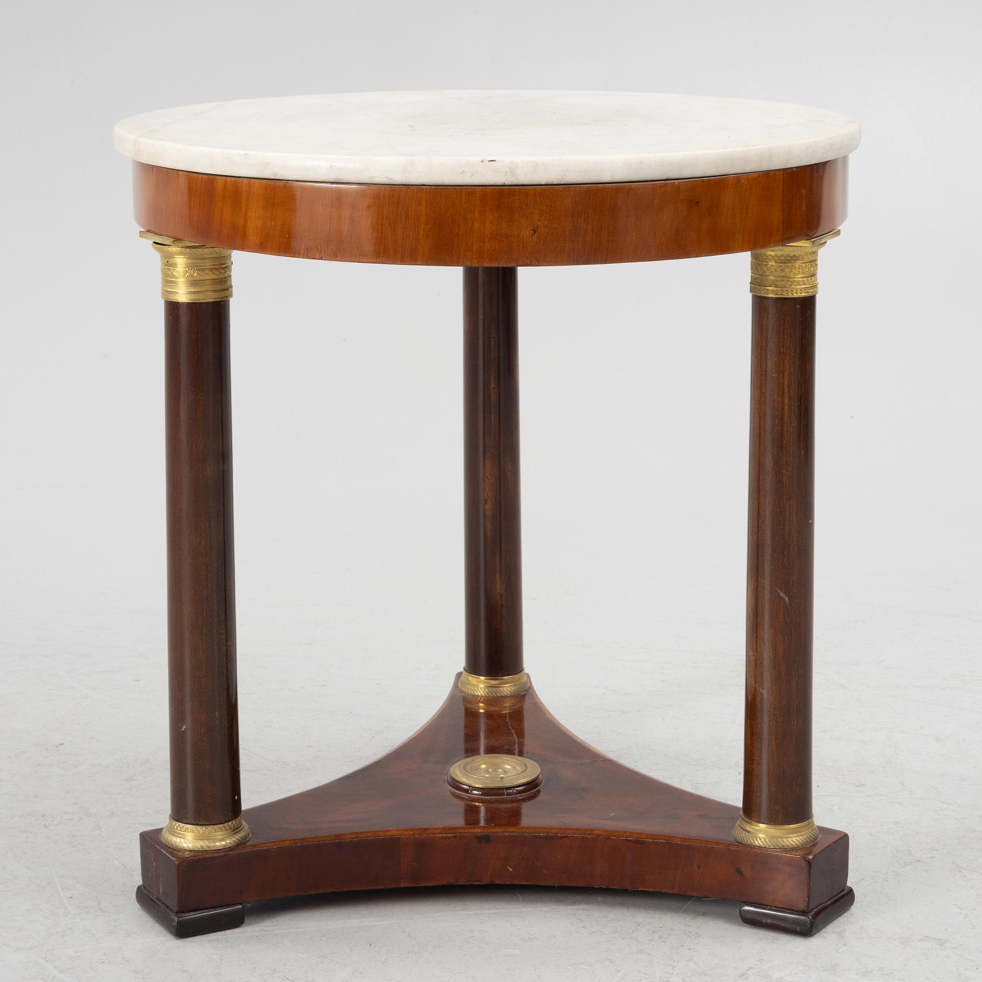 A Empire table, 19th Century.