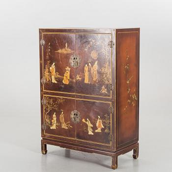 A Chinese style cabinet, later part of the 20th cwentury.