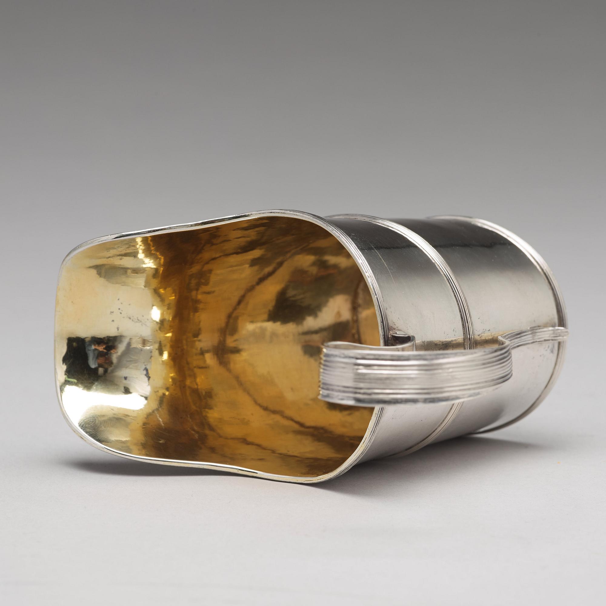 A Swedish early 19th century parcel-gilt silver cream-jug, mark of Nils Limnelius, Stockholm 1810.