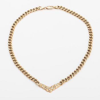 A 14K gold necklace with diamonds ca. 0.46 ct in total. With certificate.