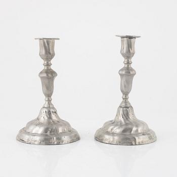 A pair of rococo pewter candelsticks, mark of J. Hassel, Enköping 1775.